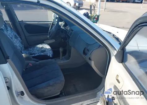 2000 Toyota Corolla Le z USA, uszkodzony, nr VIN 1NXBR12E6YZ319786